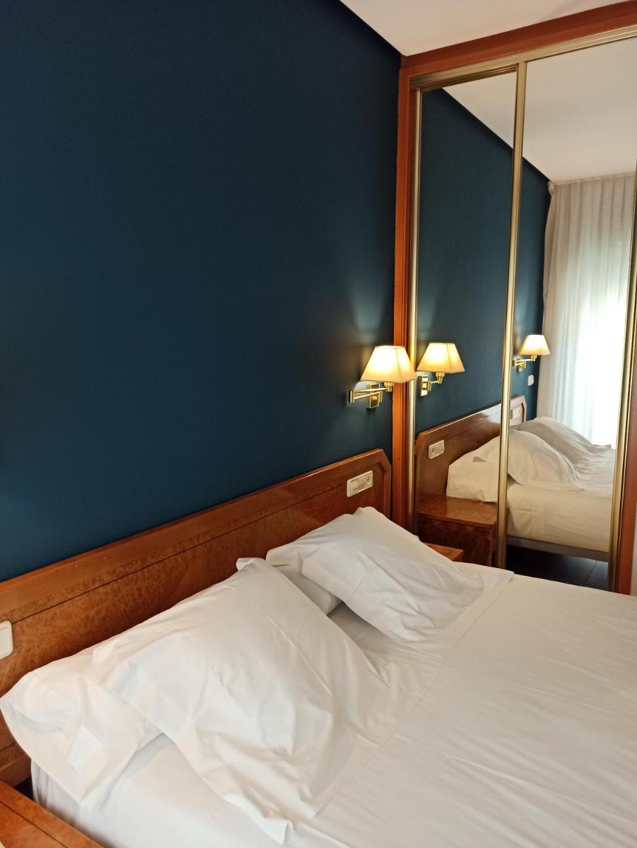 Cama o camas de una habitación en ARVA Spa París