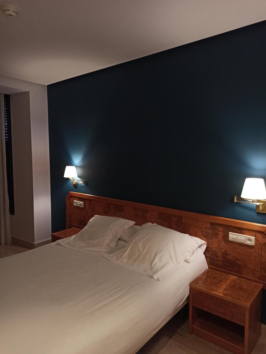 Cama o camas de una habitación en ARVA Spa París