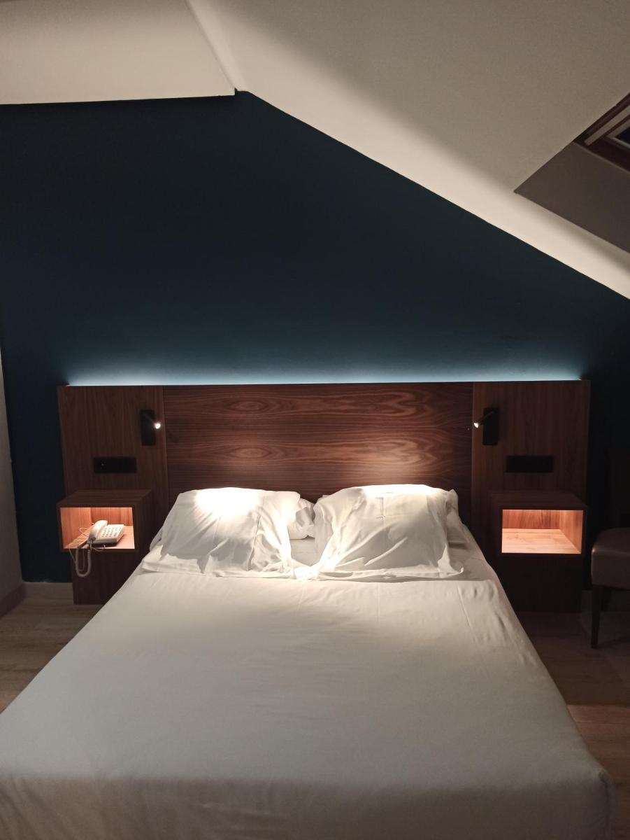 Cama o camas de una habitación en ARVA Spa París