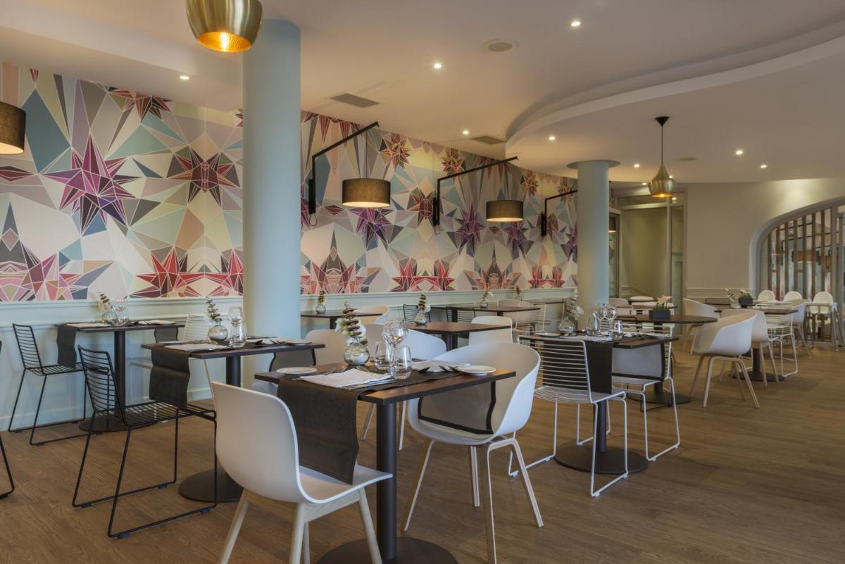 Restaurant ou autre lieu de restauration dans l'établissement Hôtel Les Jardins De Sainte-Maxime