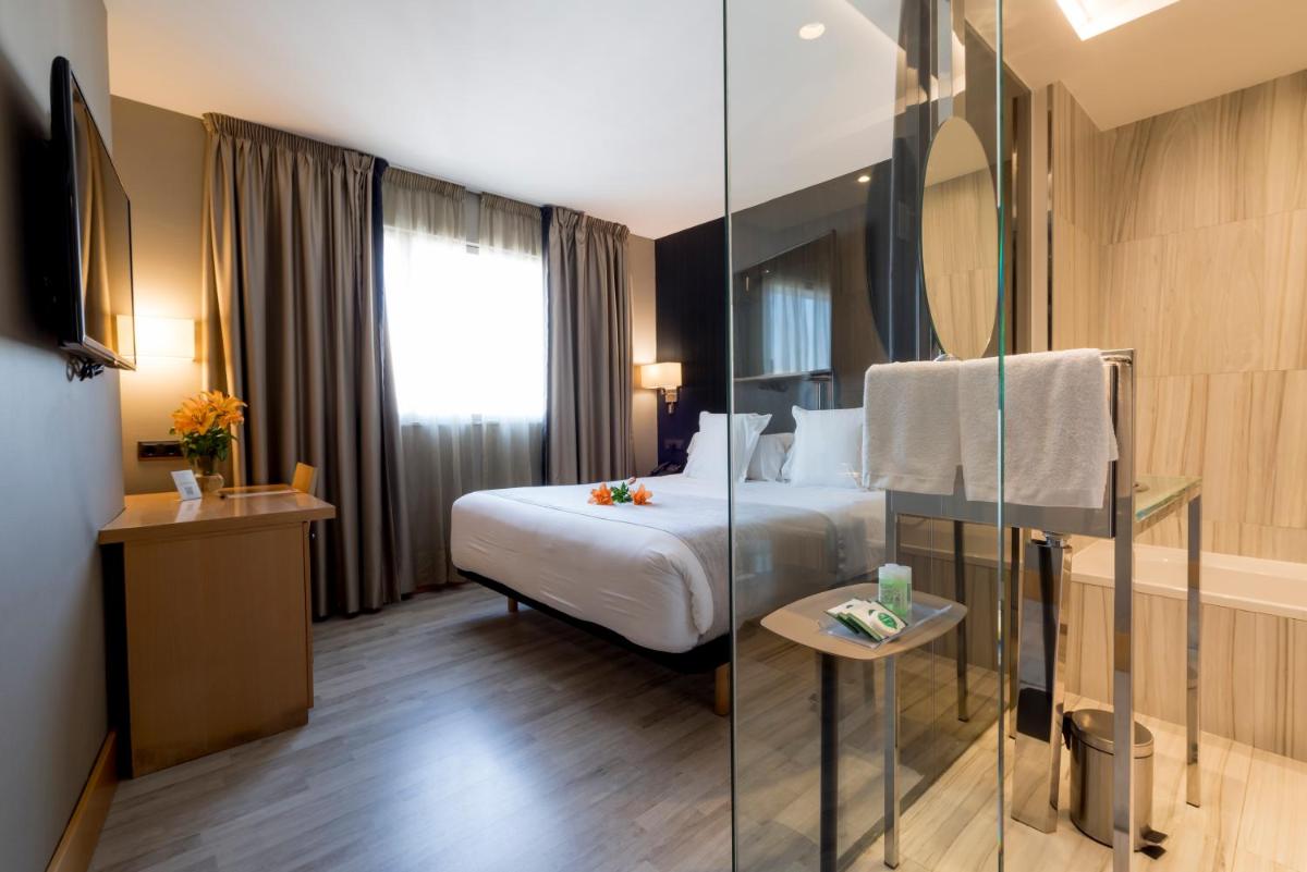 Cama o camas de una habitación en Hotel Plaza