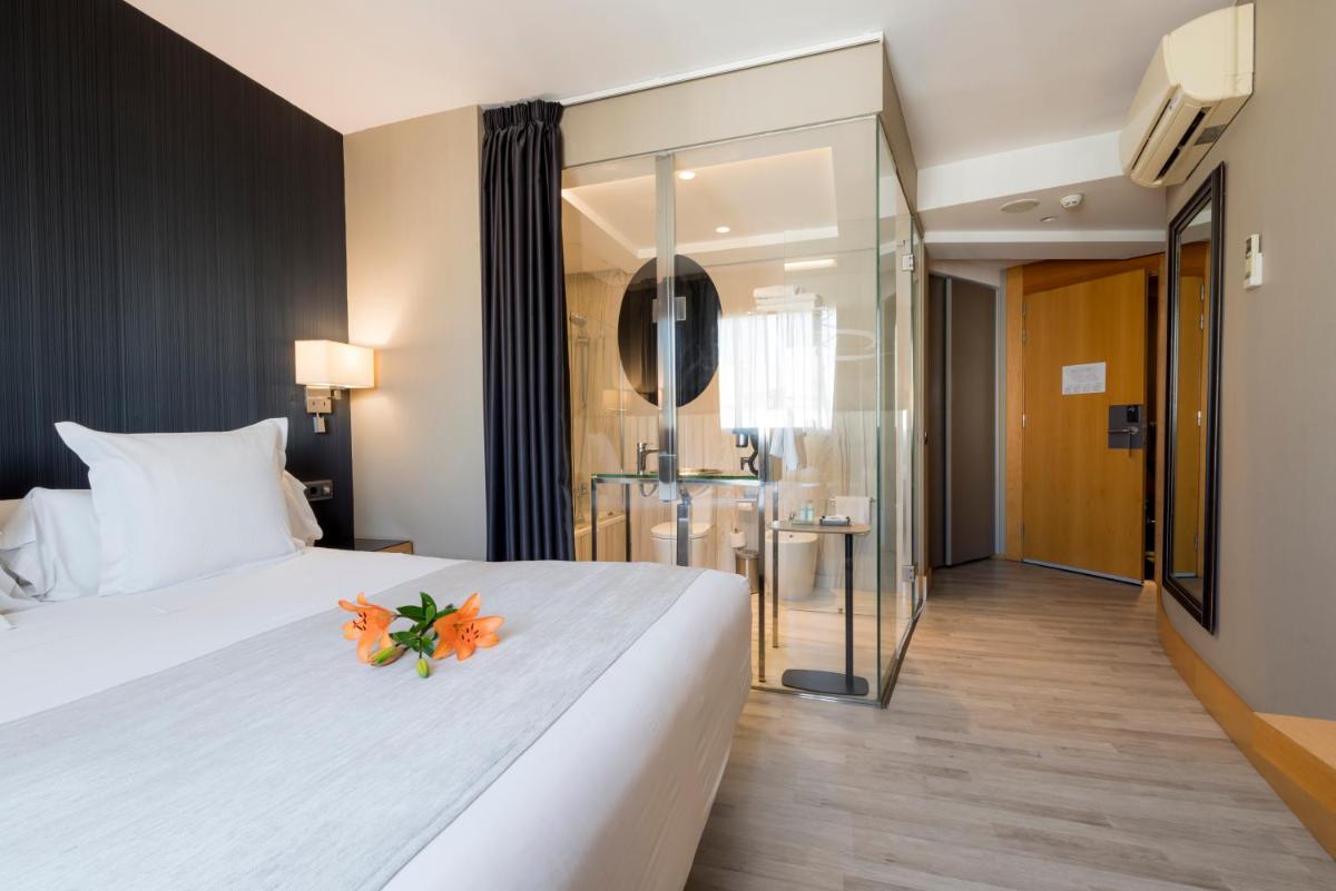 Cama o camas de una habitación en Hotel Plaza