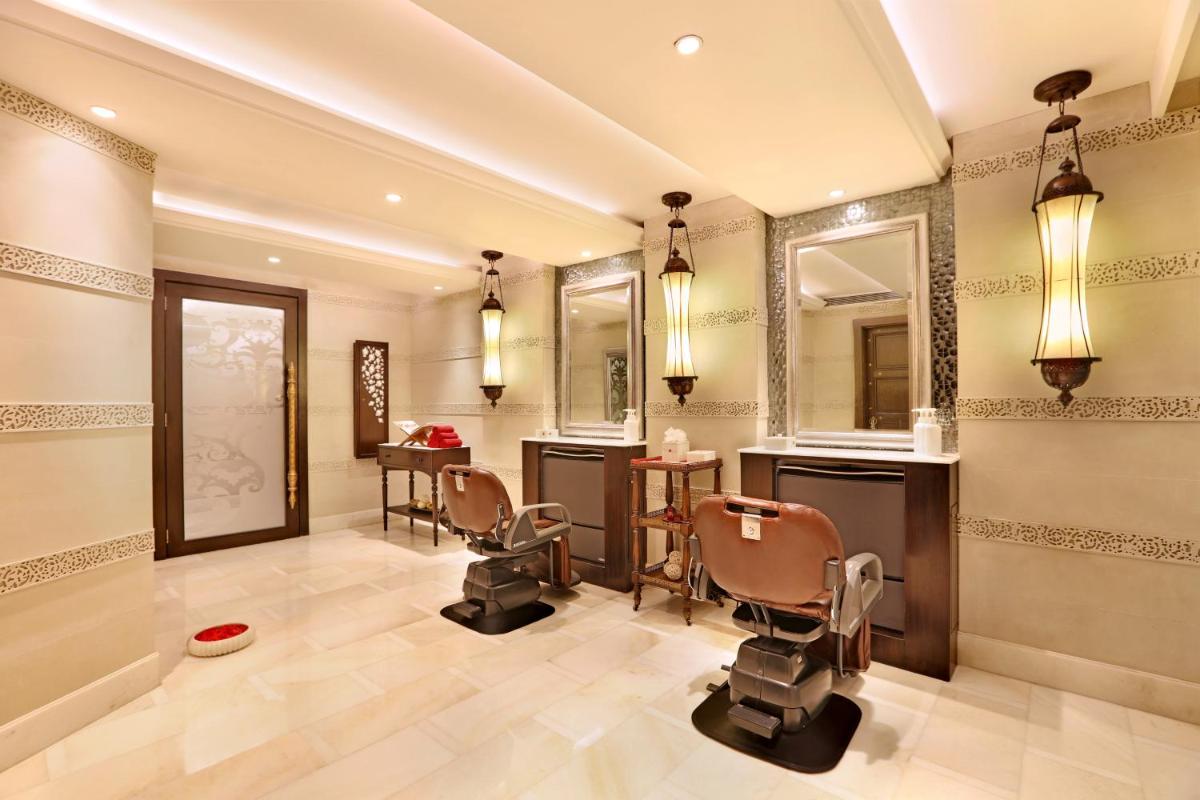 a room with a salon with chairs and mirrors at ITC Grand Central, a Luxury Collection Hotel, Mumbai in Mumbai