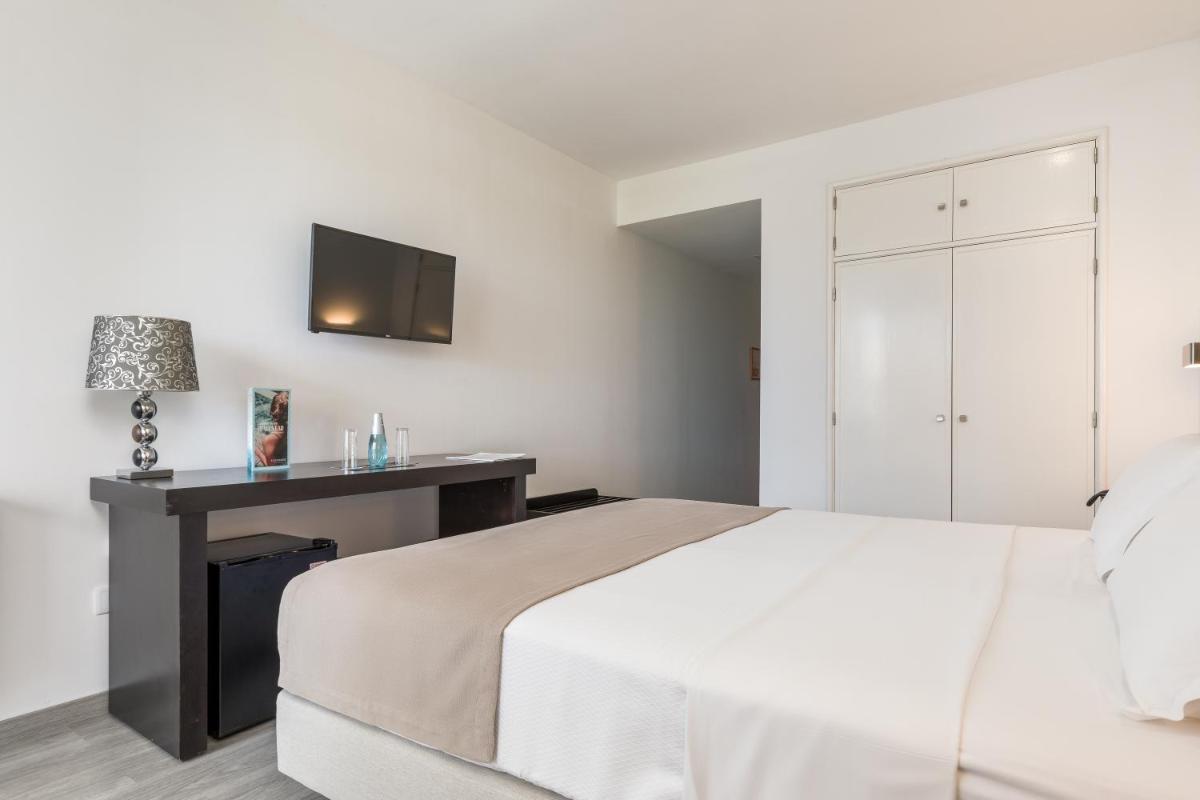 Uma cama ou camas num quarto em Hotel Do Parque - Congress & SPA