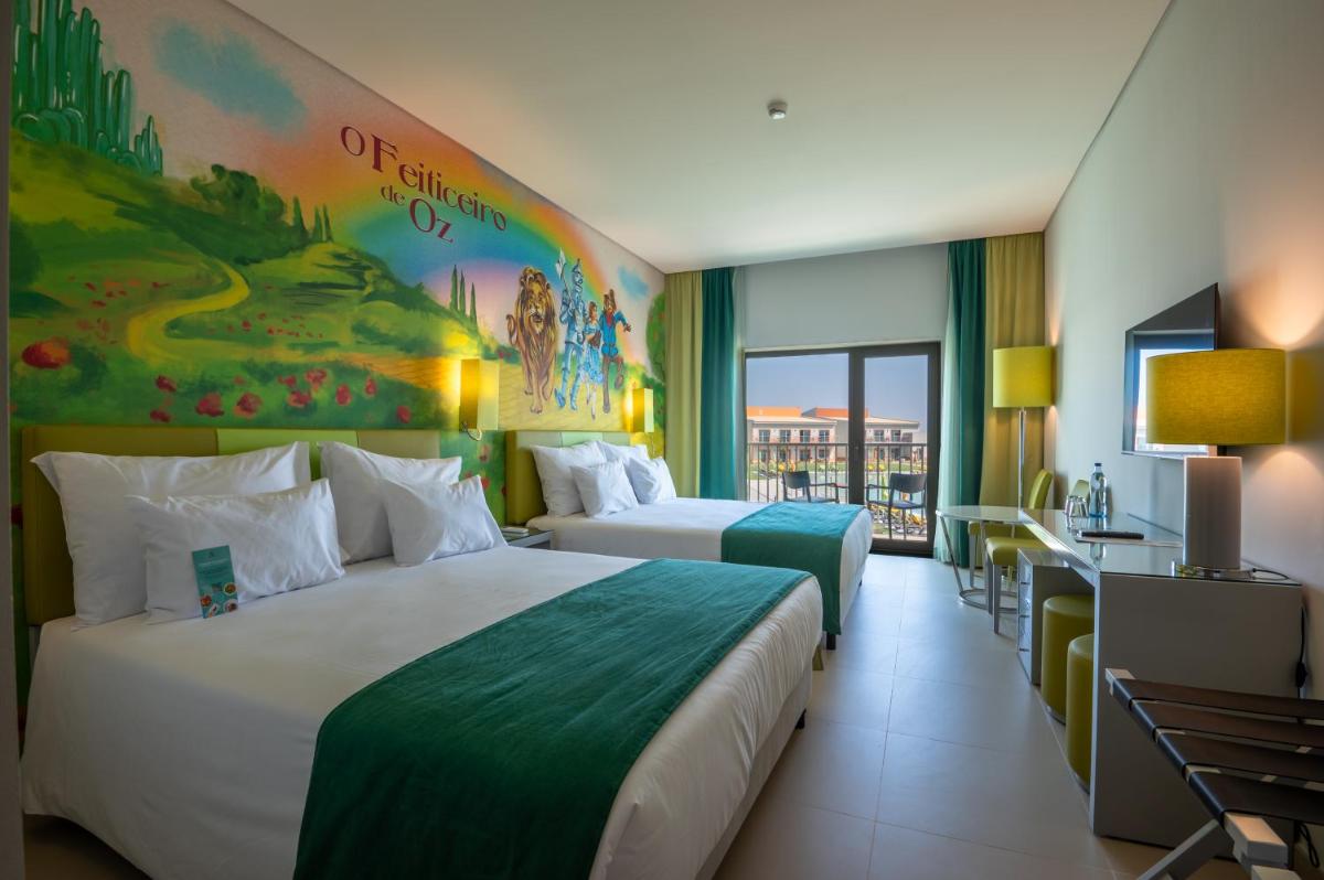Uma cama ou camas num quarto em Vila Gale Nep Kids