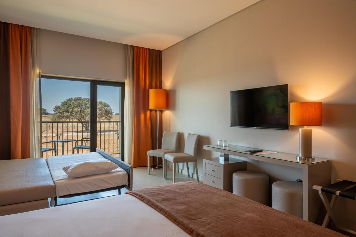 Uma cama ou camas num quarto em Vila Gale Nep Kids