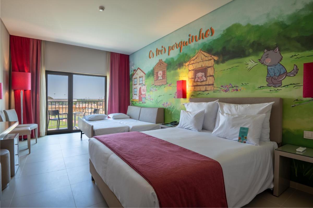 Uma cama ou camas num quarto em Vila Gale Nep Kids