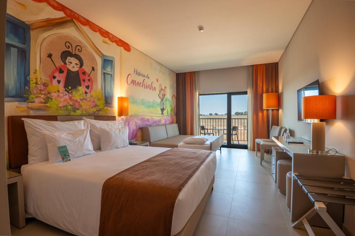 Uma cama ou camas num quarto em Vila Gale Nep Kids
