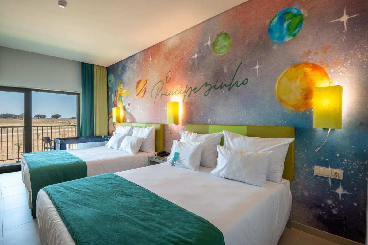 Uma cama ou camas num quarto em Vila Gale Nep Kids