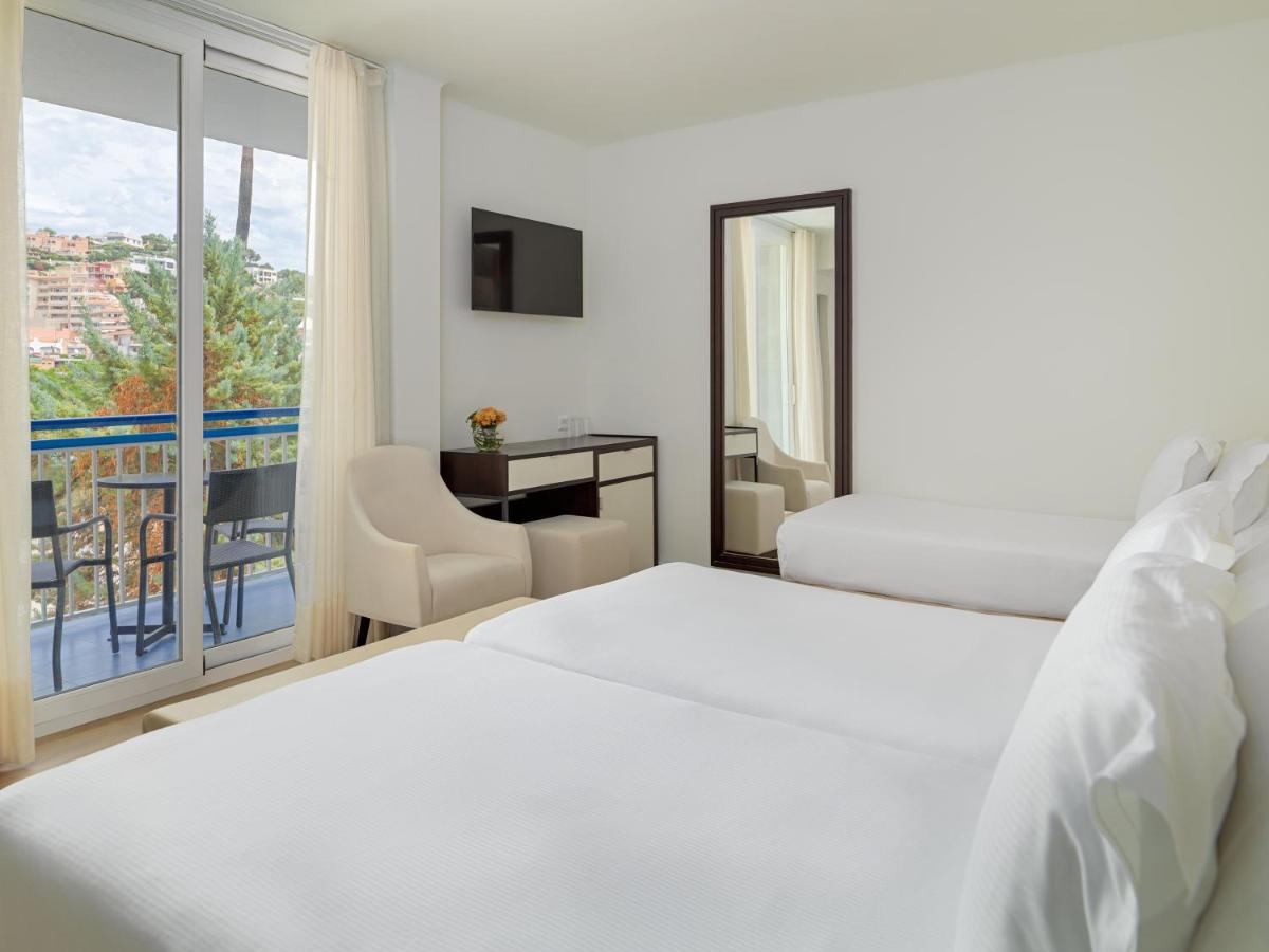 Cama o camas de una habitación en H10 Casa del Mar
