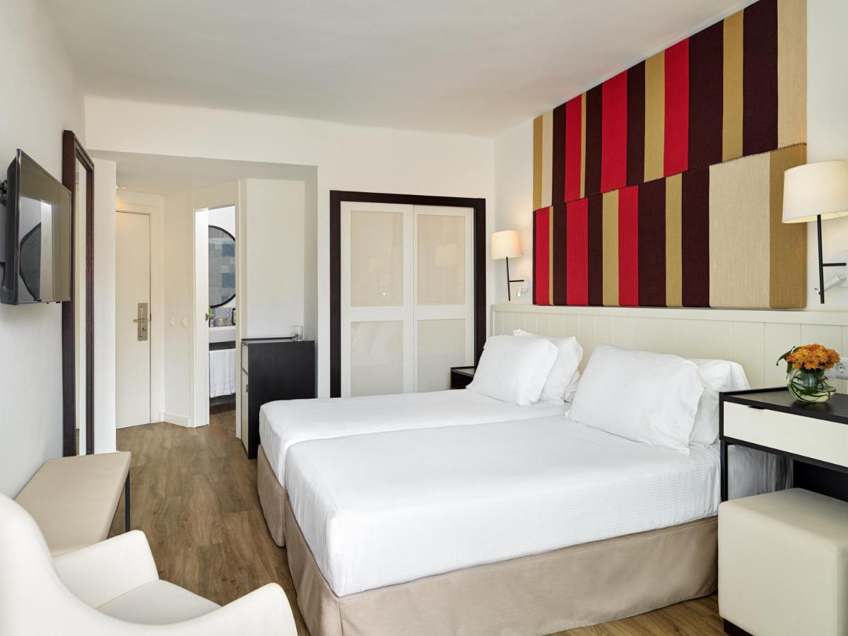 Cama o camas de una habitación en H10 Casa del Mar
