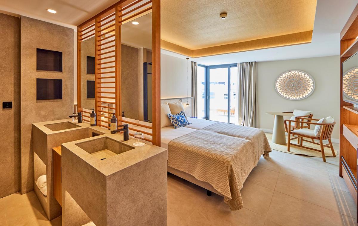 Cama o camas de una habitación en Universal Grand León & Spa