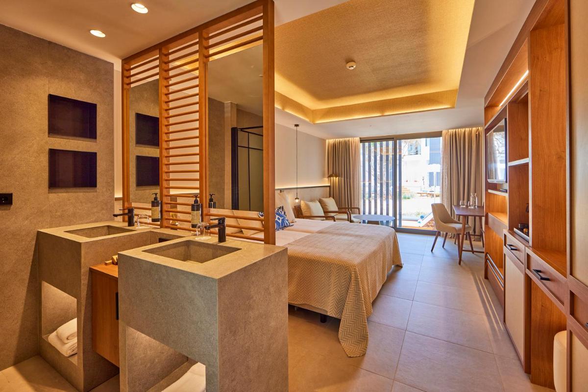 Cama o camas de una habitación en Universal Grand León & Spa