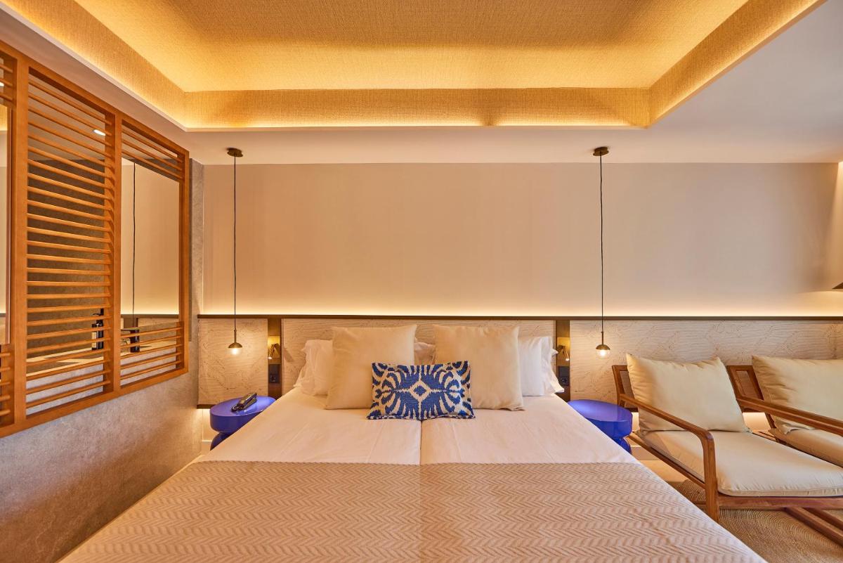 Cama o camas de una habitación en Universal Grand León & Spa