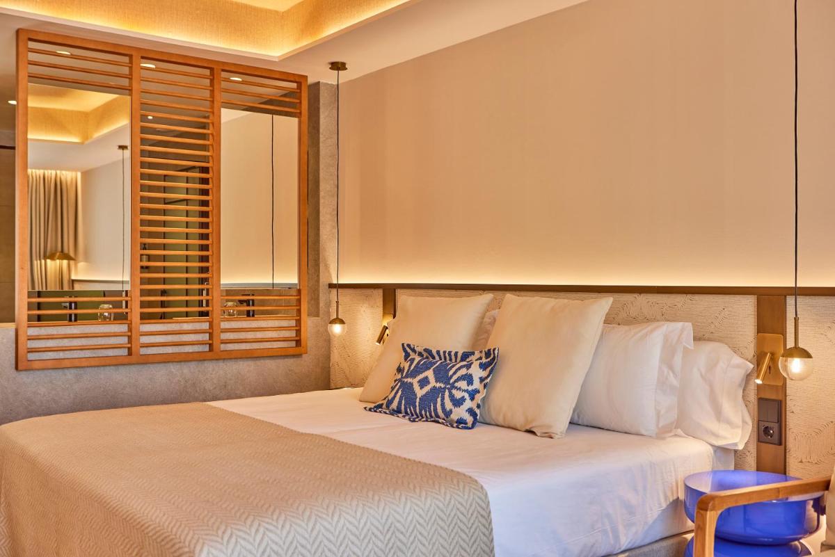 Cama o camas de una habitación en Universal Grand León & Spa