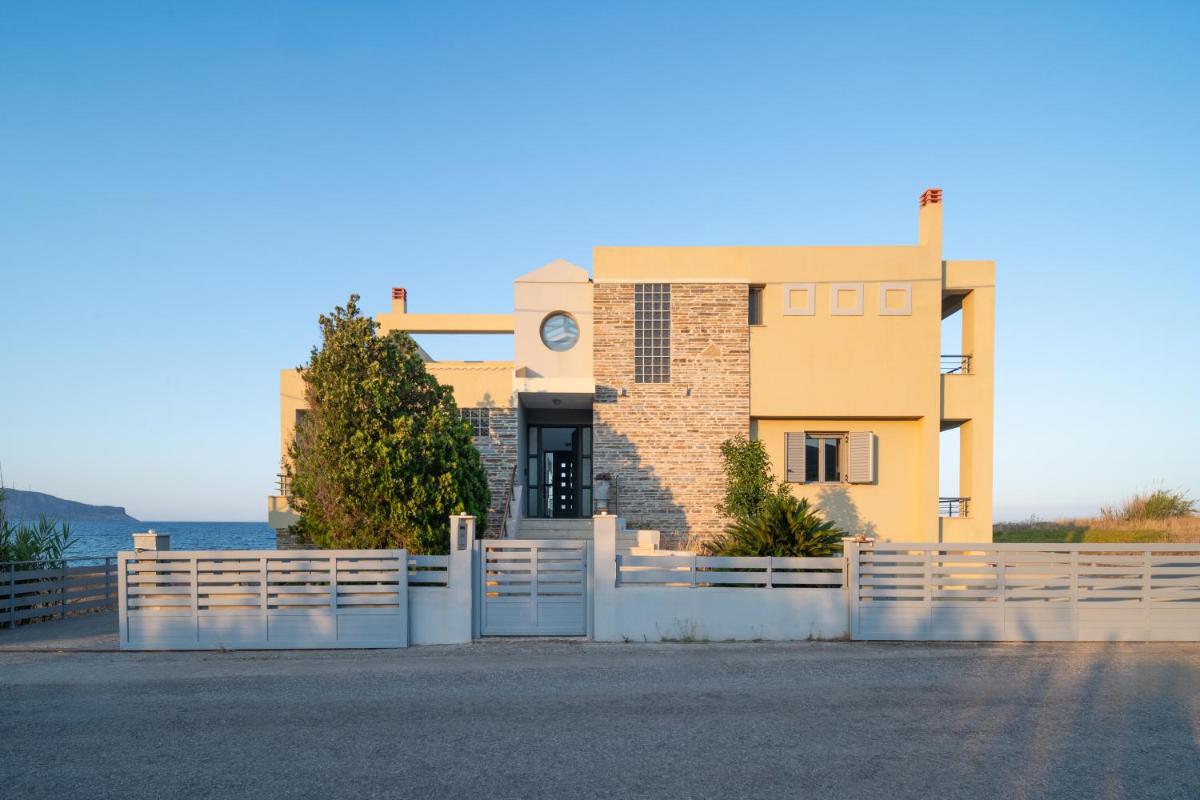 Spacious beachfront maisonettes with stunning views & a private beach - Housity