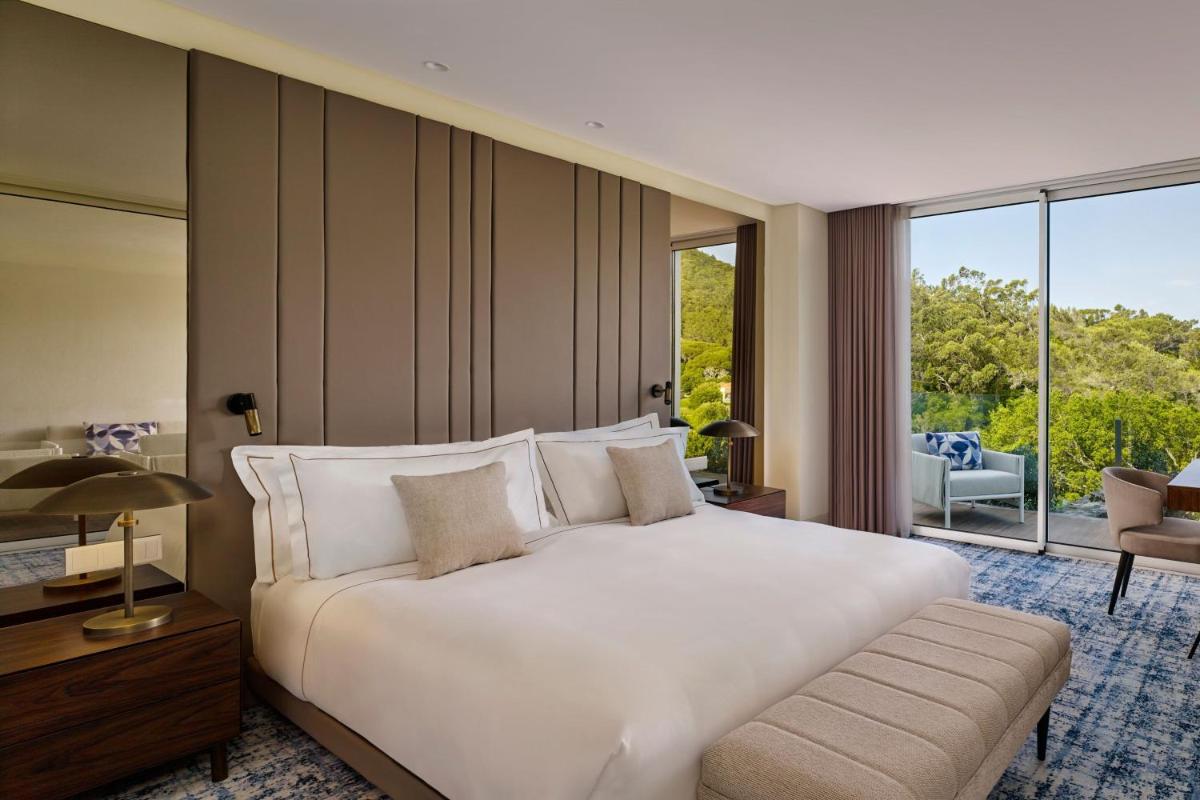 Uma cama ou camas num quarto em Penha Longa Resort