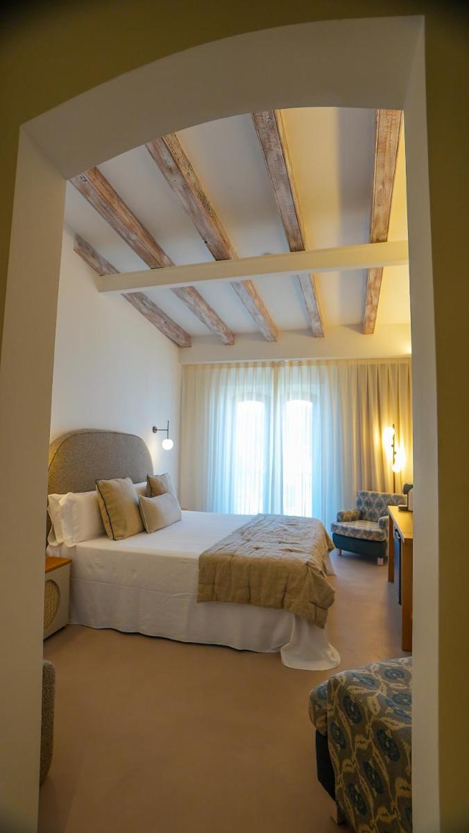 Cama o camas de una habitación en Hotel Spa Porto Cristo