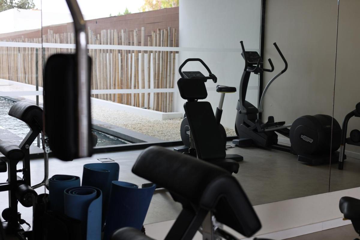 Gimnasio o instalaciones de fitness de Hotel Cala Saona & Spa