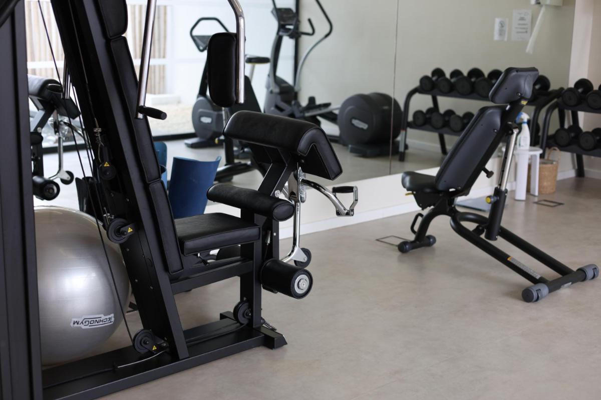 Gimnasio o instalaciones de fitness de Hotel Cala Saona & Spa