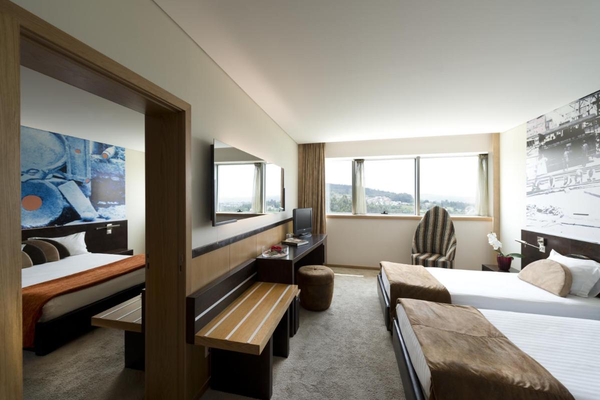 Uma cama ou camas num quarto em Penafiel Park Hotel & Spa