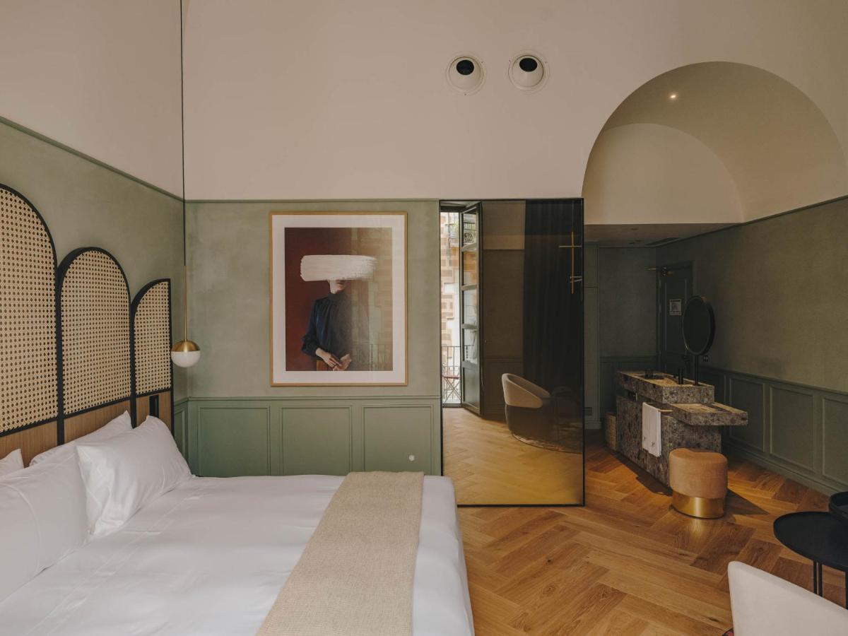 Cama o camas de una habitación en Hotel Palau Fugit
