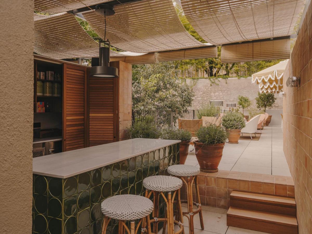 Un restaurante o sitio para comer en Hotel Palau Fugit