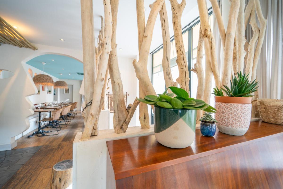 Coin salon dans l'établissement La Finca Hôtel & Spa