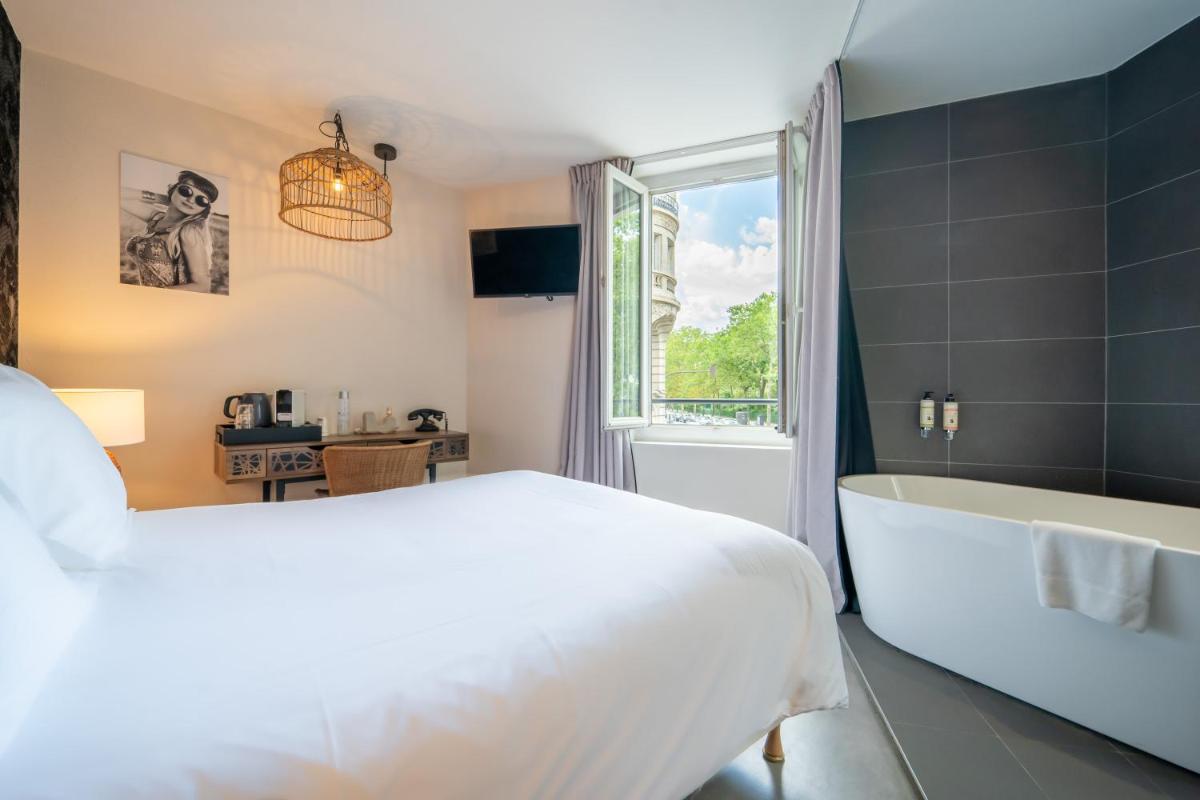 Un ou plusieurs lits dans un hébergement de l'établissement La Finca Hôtel & Spa