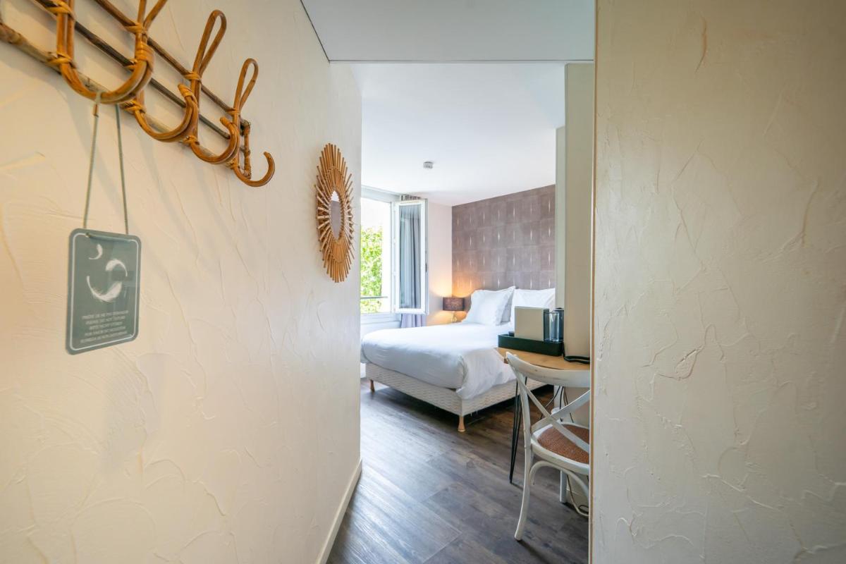 Un ou plusieurs lits dans un hébergement de l'établissement La Finca Hôtel & Spa