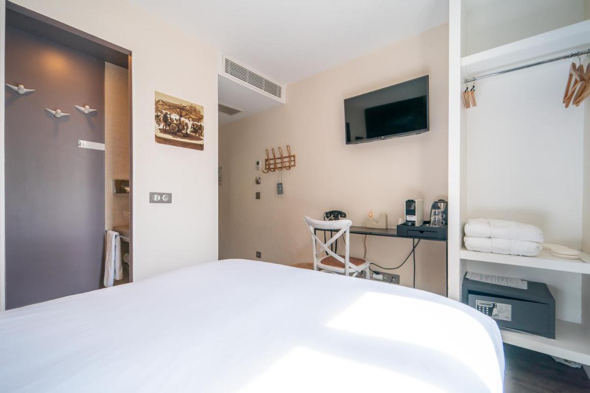 Un ou plusieurs lits dans un hébergement de l'établissement La Finca Hôtel & Spa