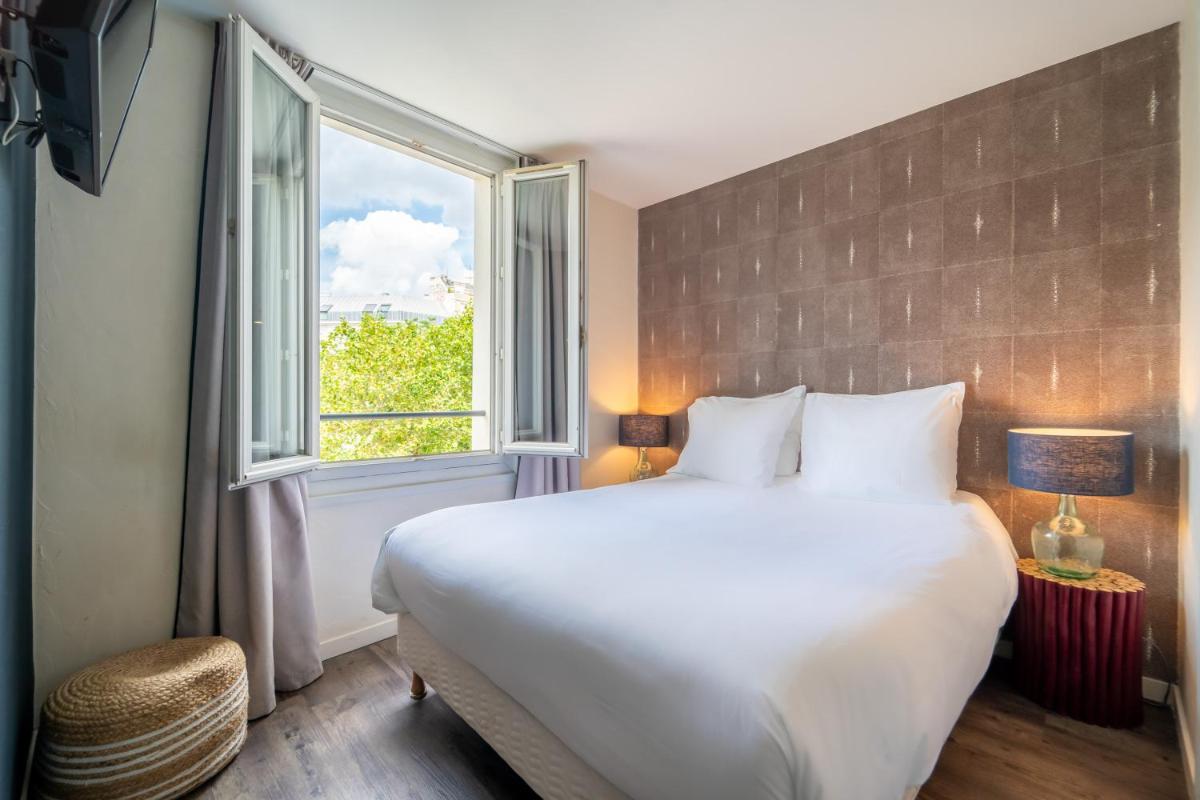 Un ou plusieurs lits dans un hébergement de l'établissement La Finca Hôtel & Spa
