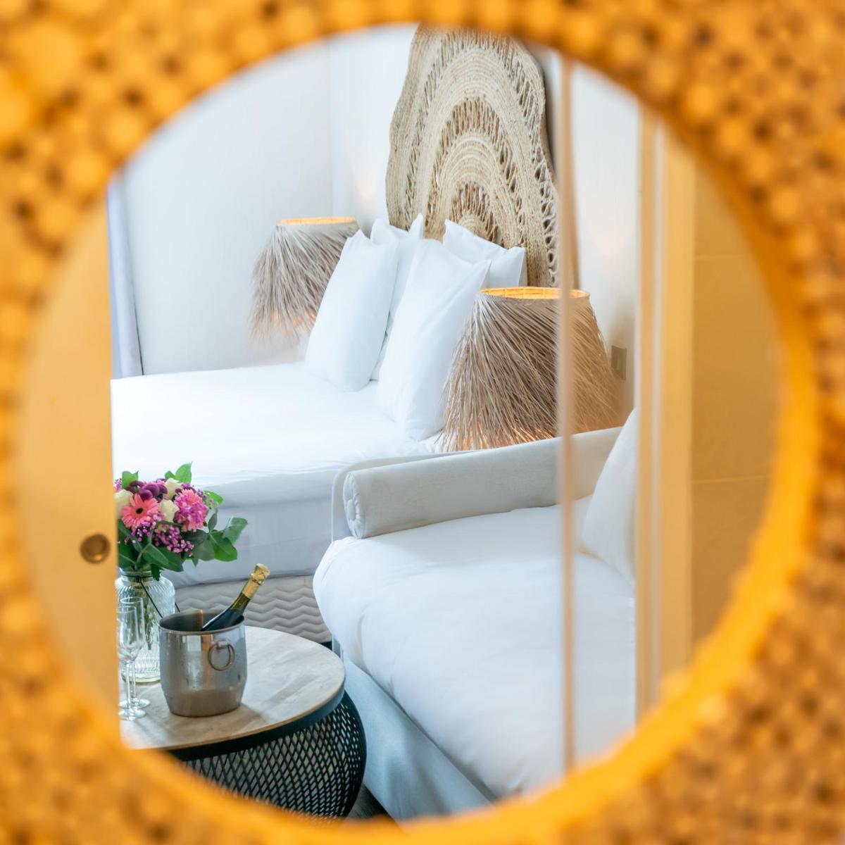 Un ou plusieurs lits dans un hébergement de l'établissement La Finca Hôtel & Spa
