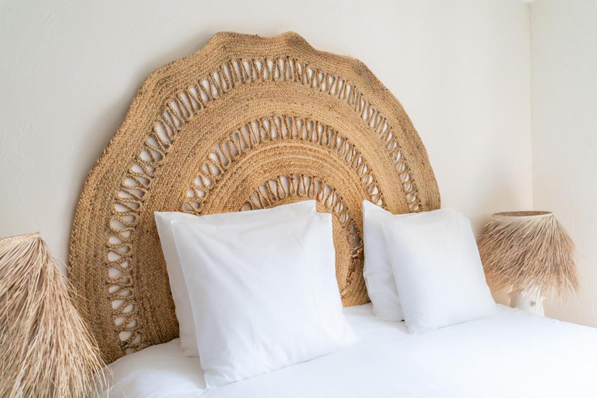 Un ou plusieurs lits dans un hébergement de l'établissement La Finca Hôtel & Spa
