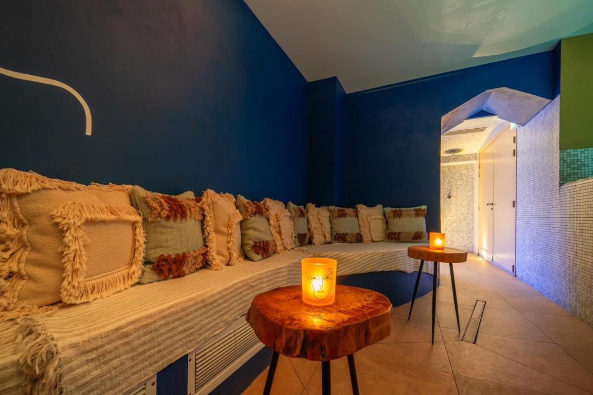 Coin salon dans l'établissement La Finca Hôtel & Spa