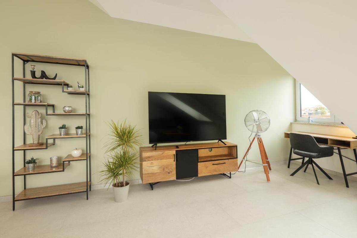 SweetHome - Poing Apartments - Housity