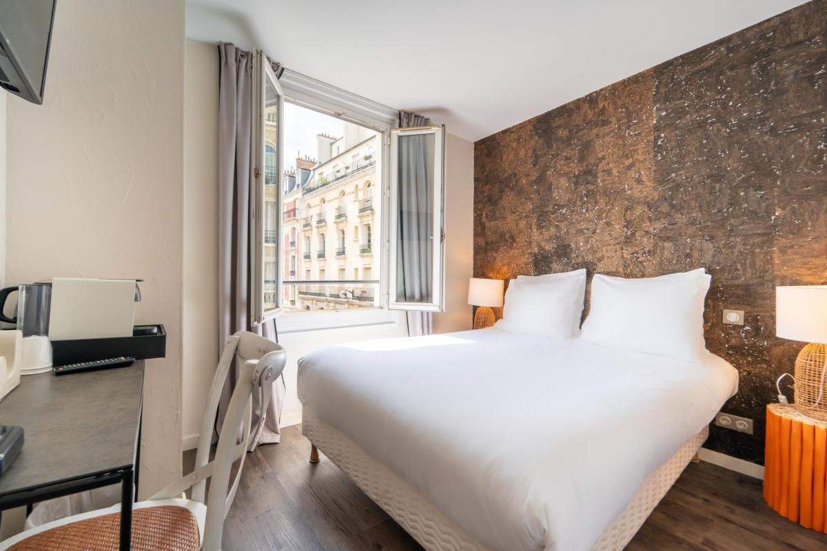 Un ou plusieurs lits dans un hébergement de l'établissement La Finca Hôtel & Spa