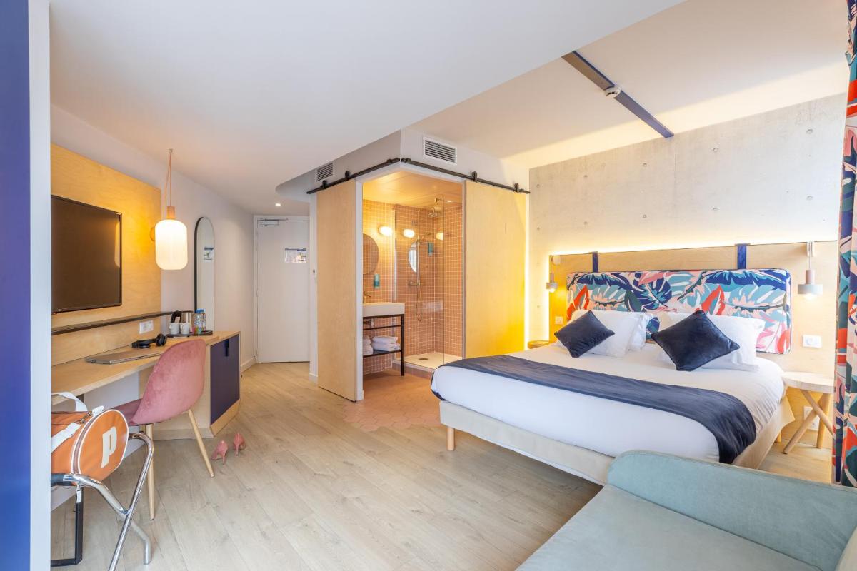 Un ou plusieurs lits dans un hébergement de l'établissement Urban Hotel & Spa Aix-les-Bains - BW Signature Collection