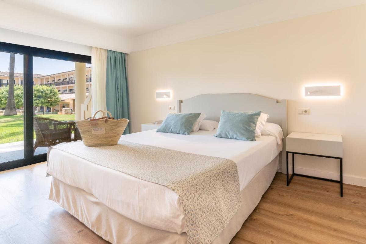 Cama o camas de una habitación en CM Mallorca Palace - Only Adults