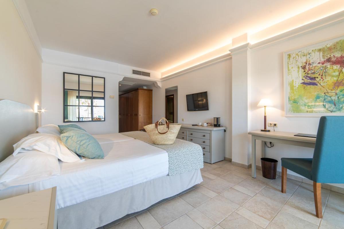 Cama o camas de una habitación en CM Mallorca Palace - Only Adults