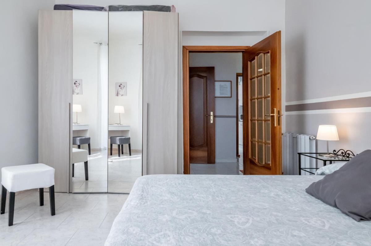 Migliarina Station Comfy Apt w/ Balcony - Housity