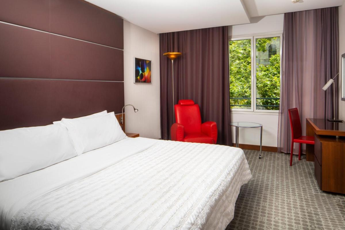 Cama o camas de una habitación en Le Meridien Barcelona