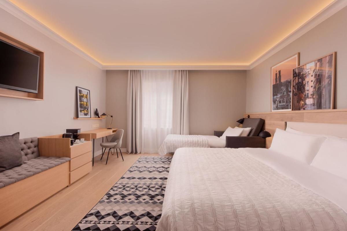 Cama o camas de una habitación en Le Meridien Barcelona