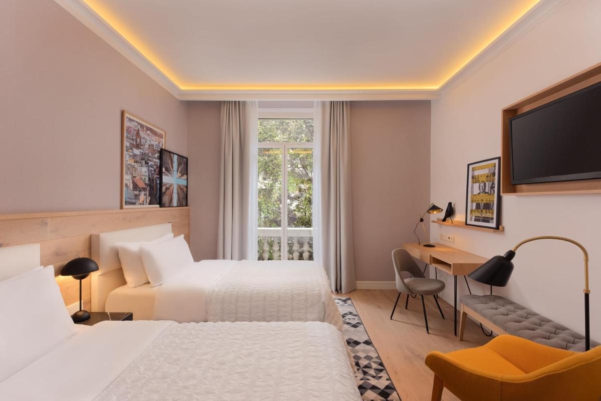 Cama o camas de una habitación en Le Meridien Barcelona