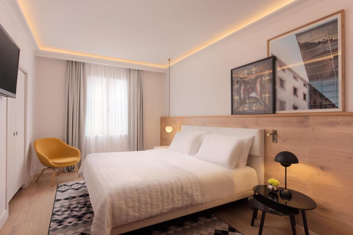 Cama o camas de una habitación en Le Meridien Barcelona