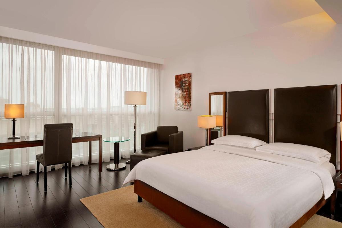 Uma cama ou camas num quarto em Sheraton Porto Hotel & Spa