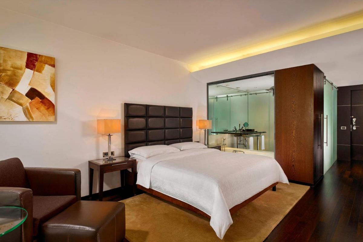 Uma cama ou camas num quarto em Sheraton Porto Hotel & Spa