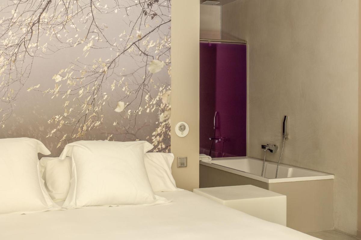 Cama o camas de una habitación en Hotel Viura