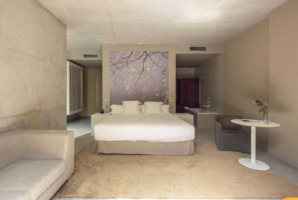 Cama o camas de una habitación en Hotel Viura