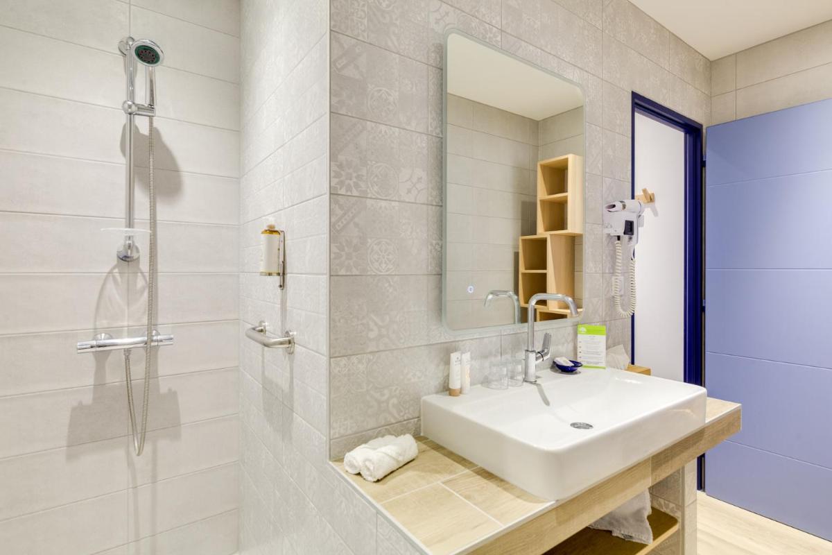 Salle de bains dans l'établissement La Cachette